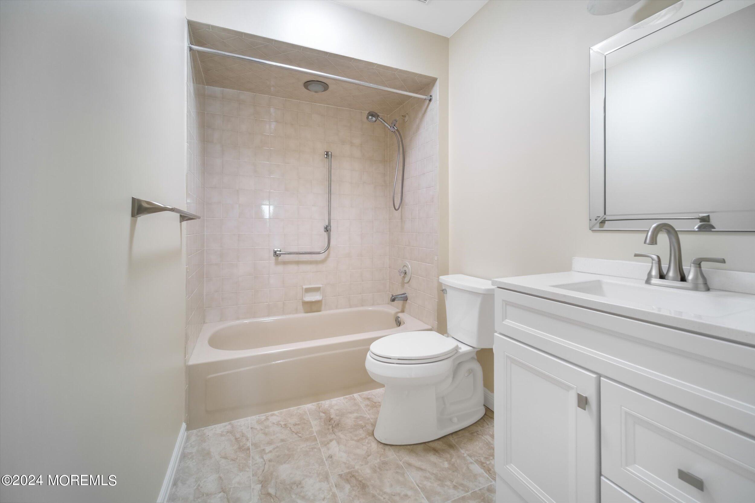 1 Lambert Way Toms River, NJ 08757 - Photo 25 of 26 a bathroom with a sink a toilet and a bathtub