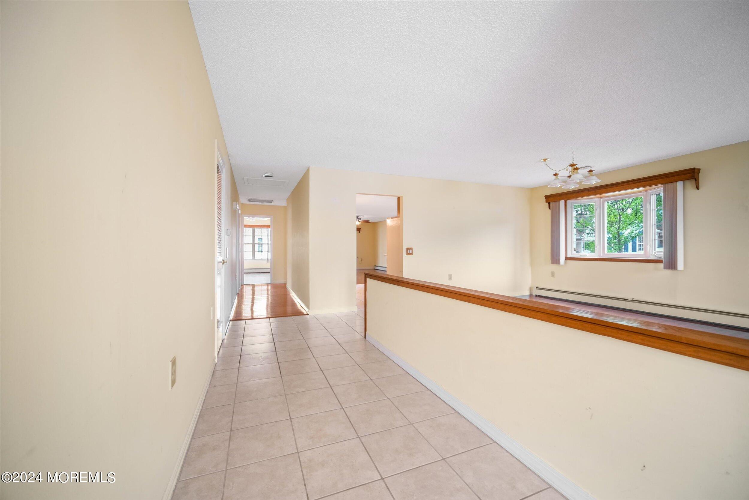 1 Lambert Way Toms River, NJ 08757 - Photo 9 of 26 a view of a hallway with a large window