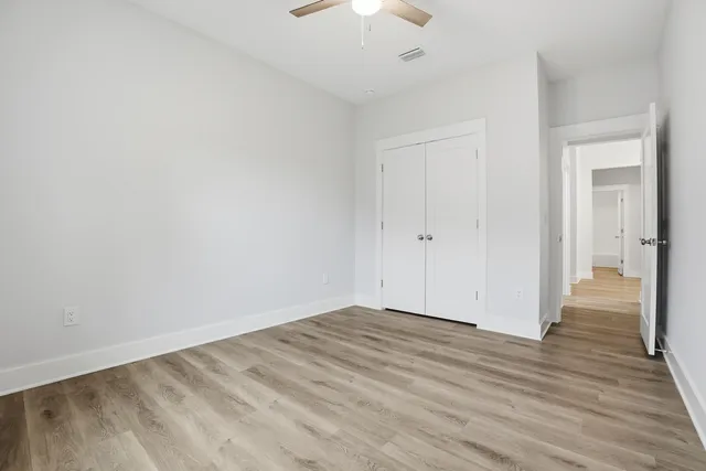 a view of a room with racks on the wall