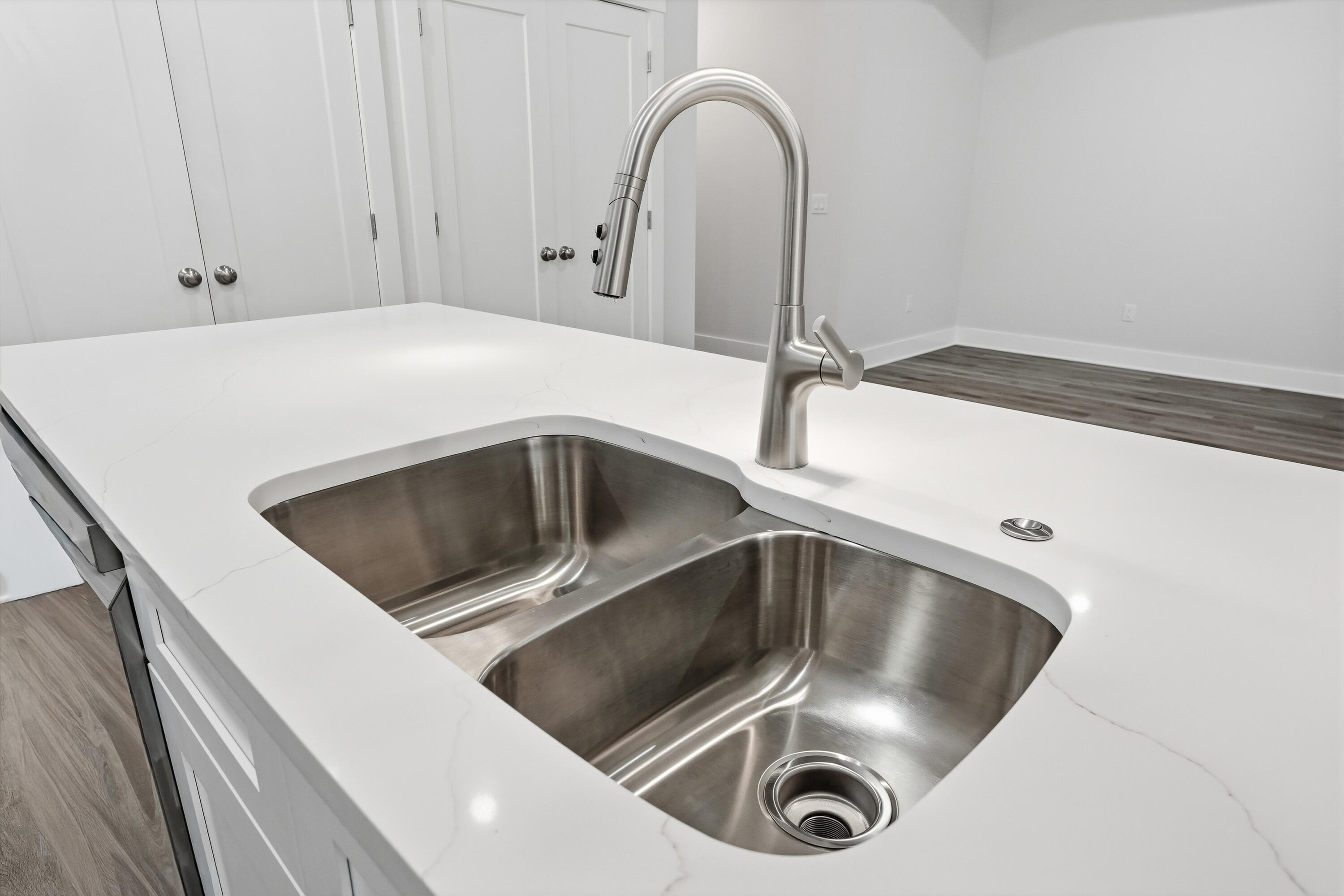 15 Plew Avenue Shalimar, FL 32579 - Photo 36 of 67 a close view of a sink a faucet and appliance in the kitchen