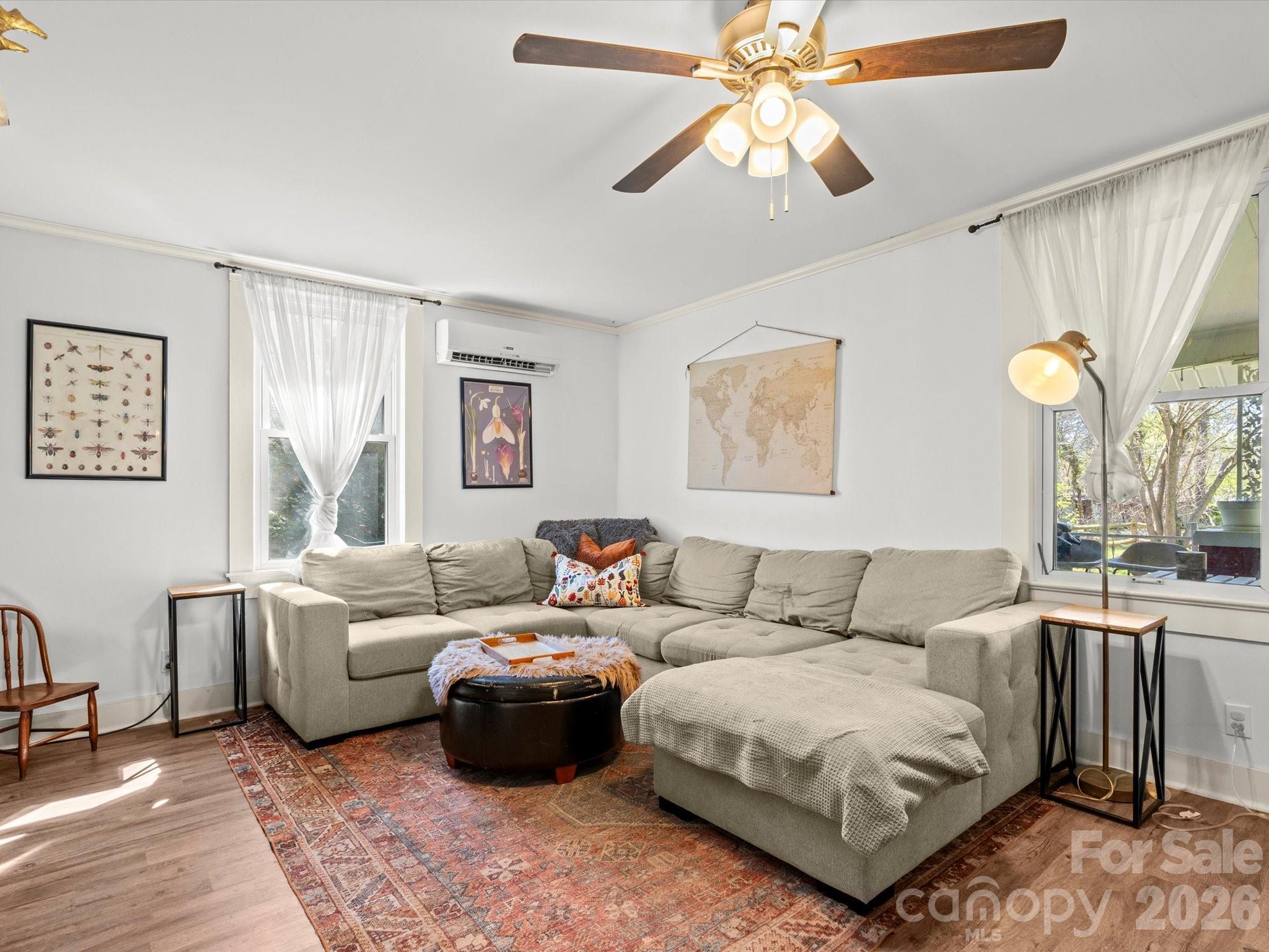 12 Maple Lane Arden, NC 28704 - Photo 11 of 31 a living room with furniture and a large window