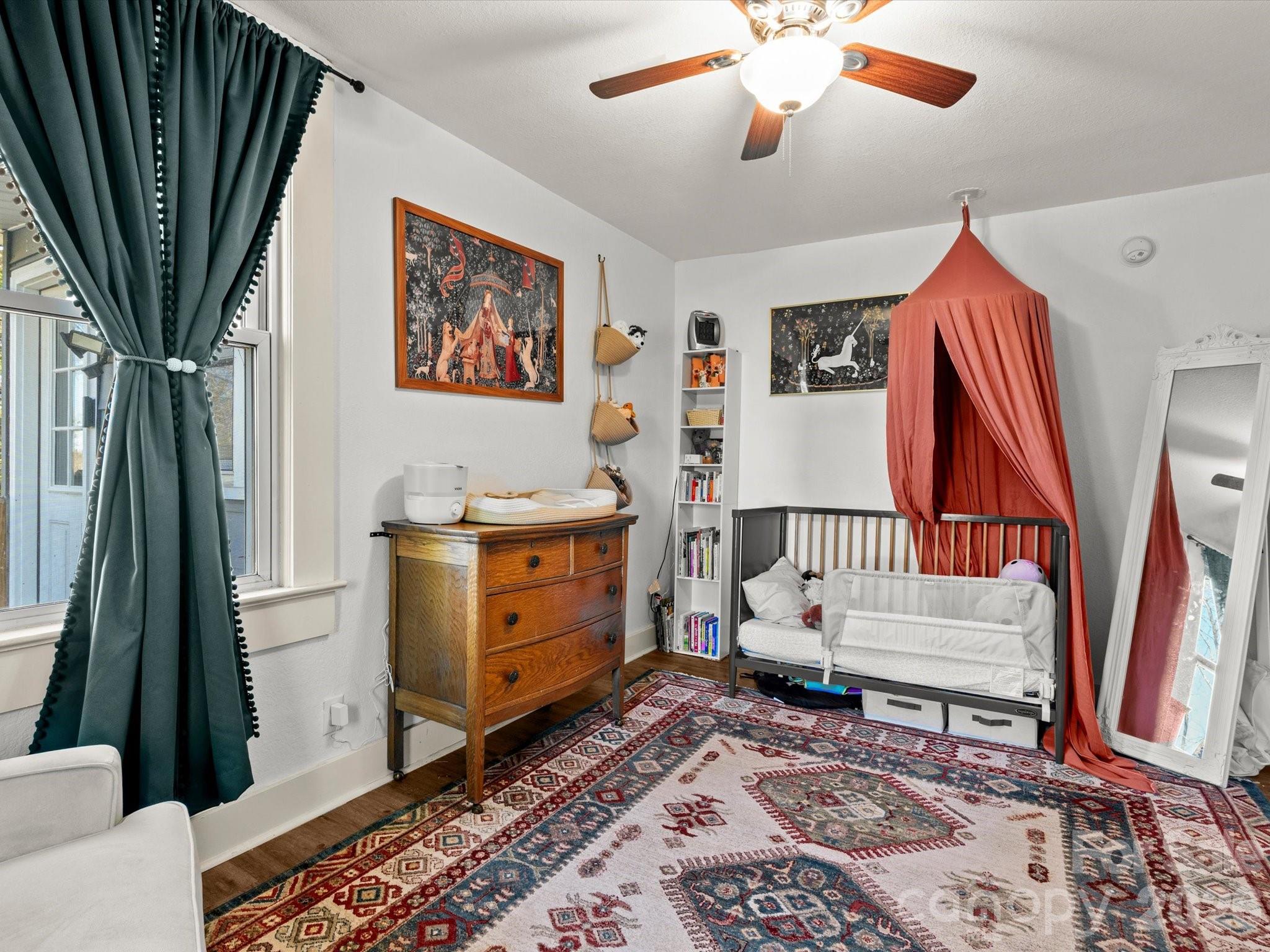 12 Maple Lane Arden, NC 28704 - Photo 20 of 31 a bedroom with furniture and a window