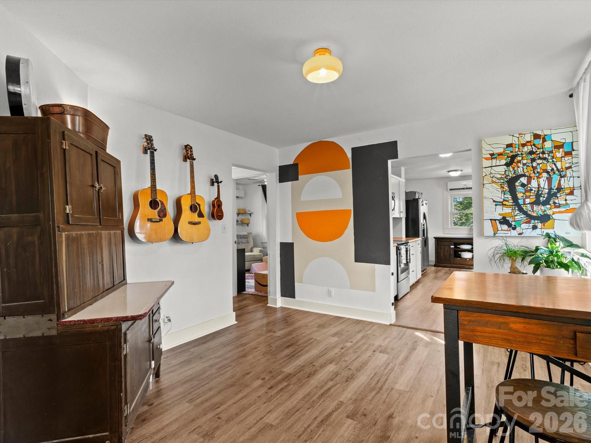 12 Maple Lane Arden, NC 28704 - Photo 28 of 31 a view of a kitchen with furniture and wooden floor