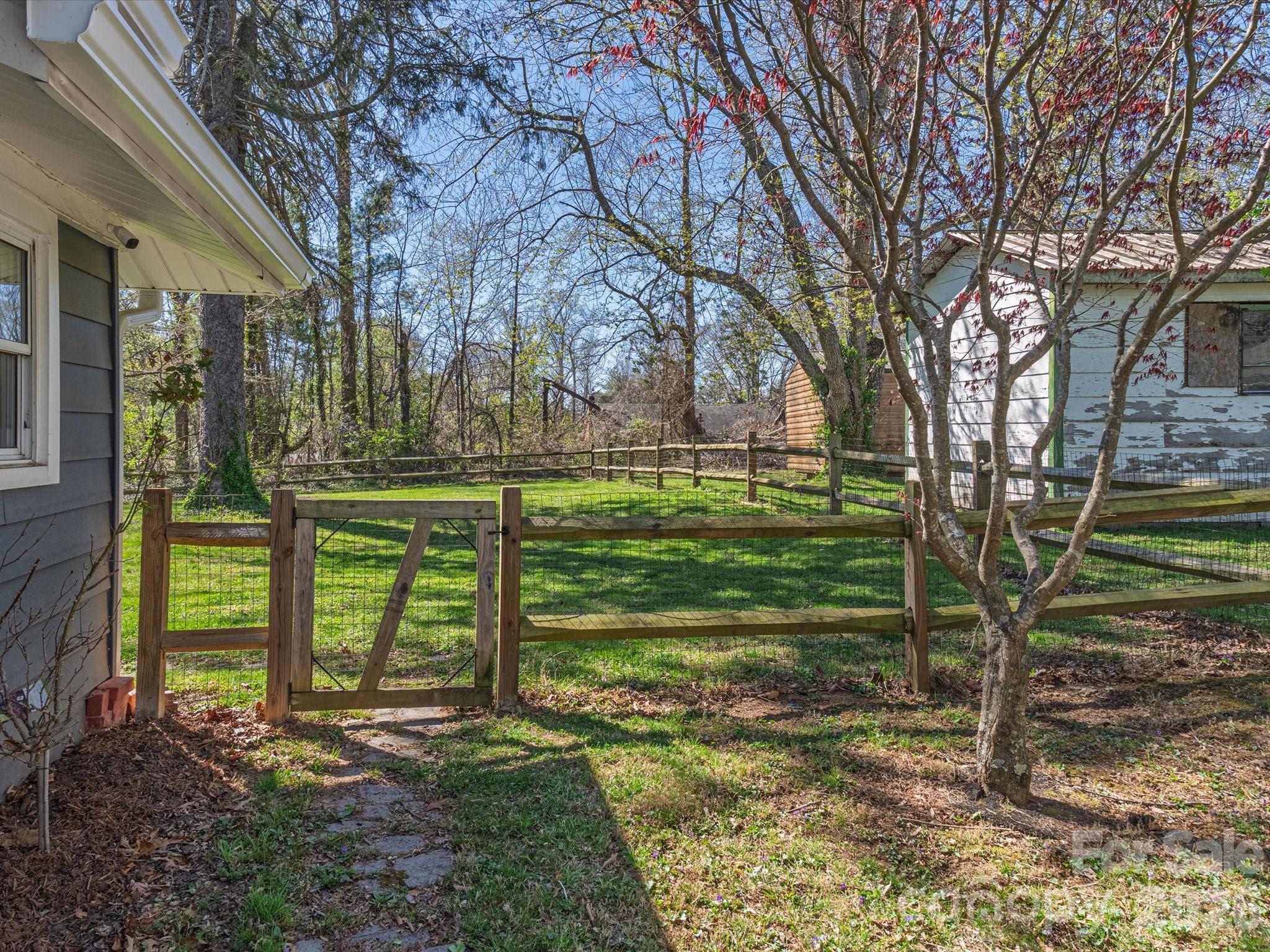 12 Maple Lane Arden, NC 28704 - Photo 3 of 31 a view of a park that has large trees
