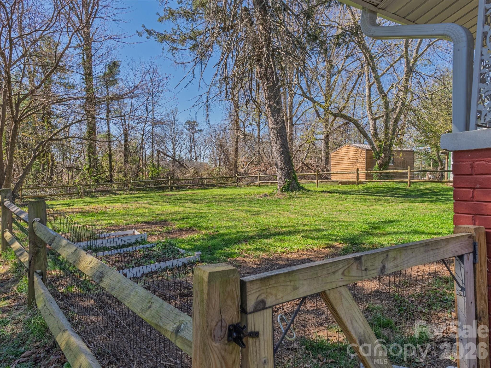 12 Maple Lane Arden, NC 28704 - Photo 4 of 31 a view of a yard with an outdoor seating