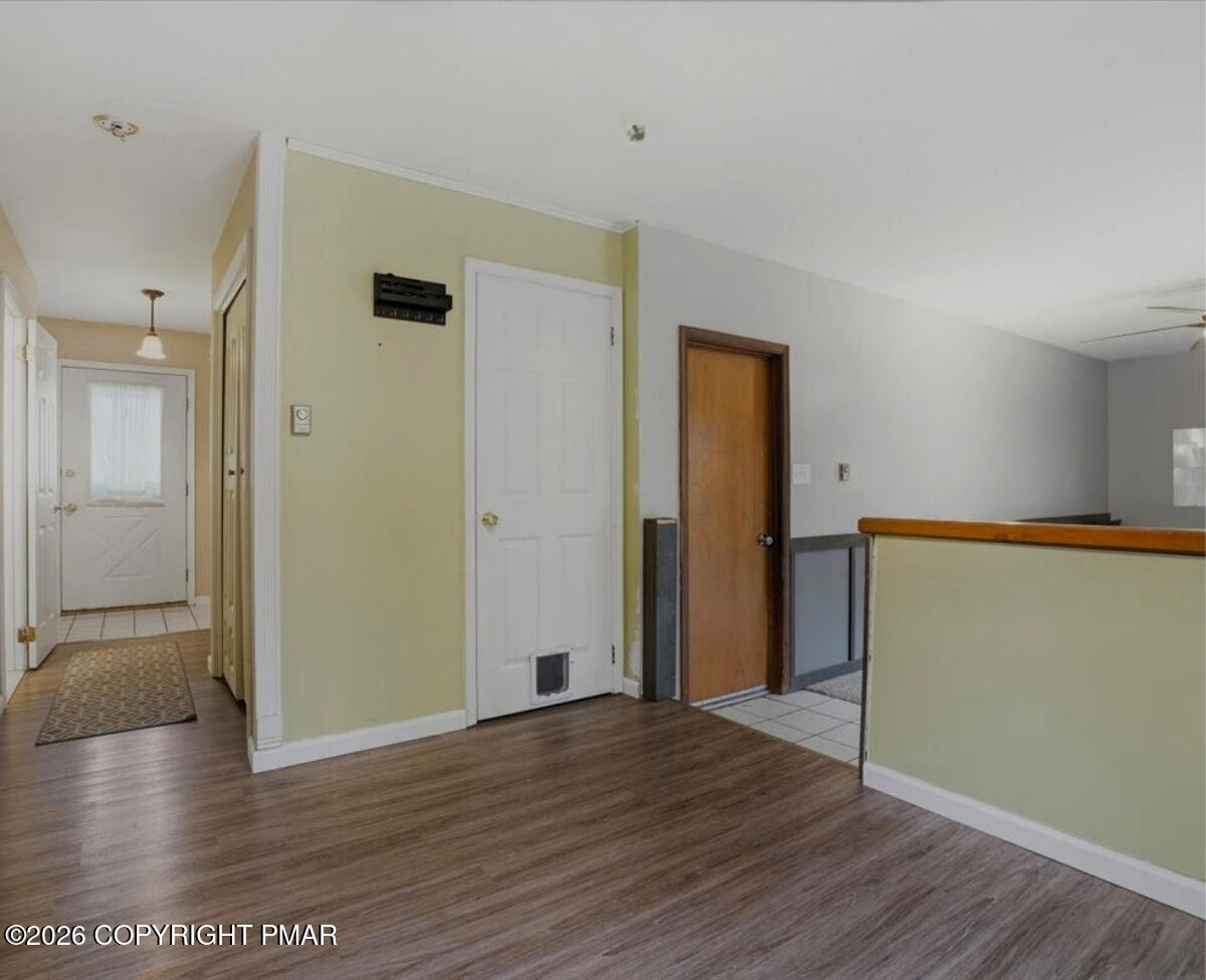 239 Sundance Road Effort, PA 18330 - Photo 16 of 60 a view of empty room with wooden floor