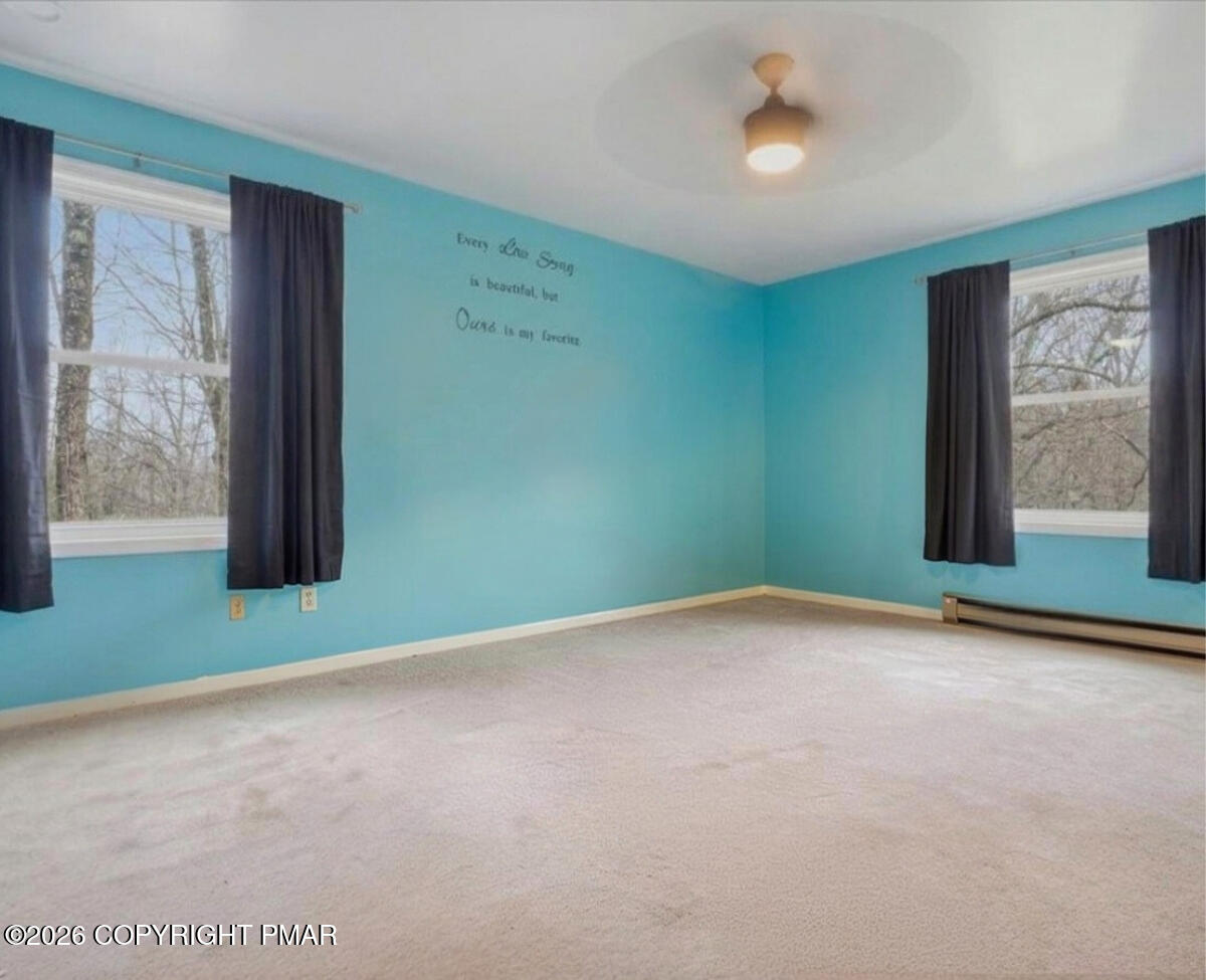 239 Sundance Road Effort, PA 18330 - Photo 22 of 60 an empty room with windows and closet