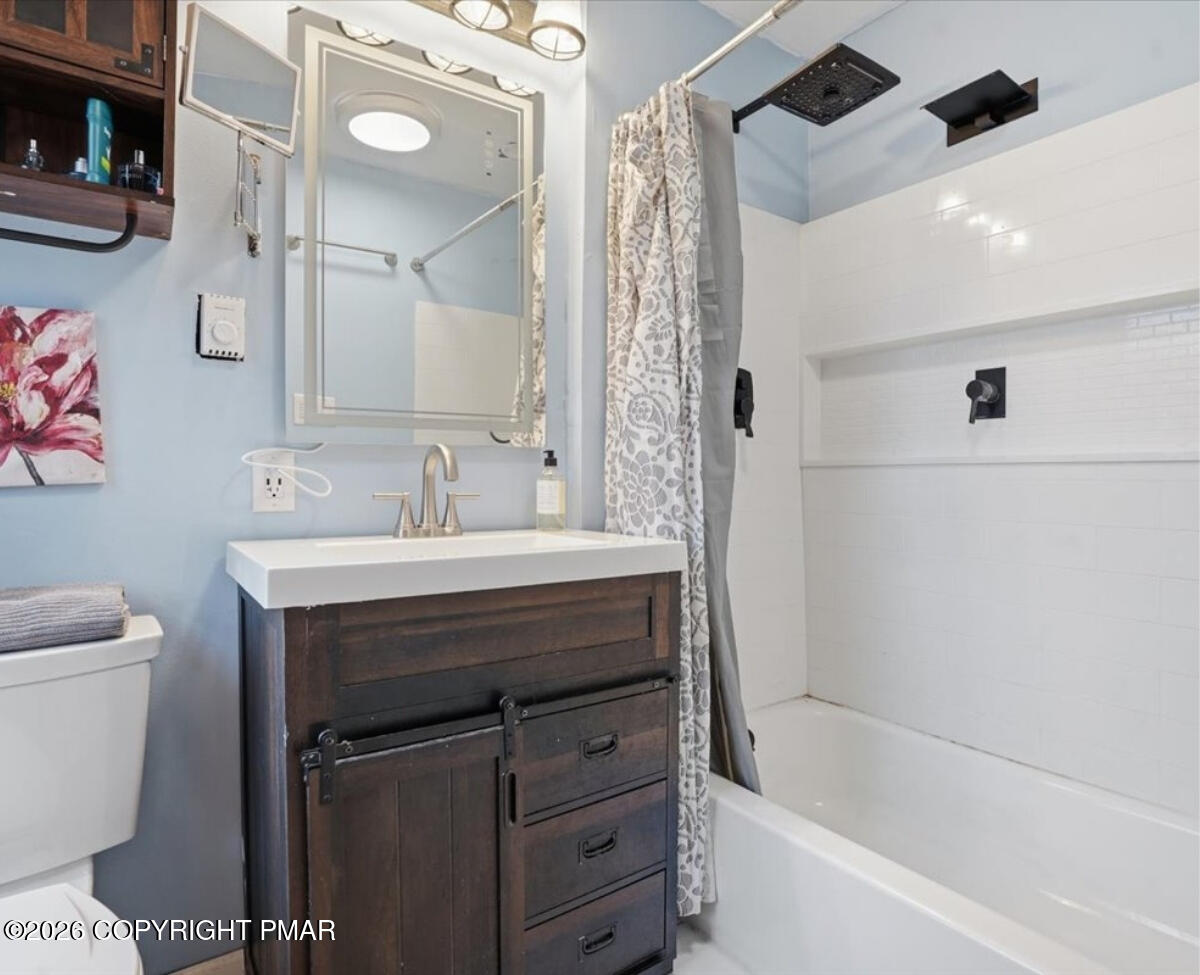 239 Sundance Road Effort, PA 18330 - Photo 25 of 60 a bathroom with a sink toilet and shower