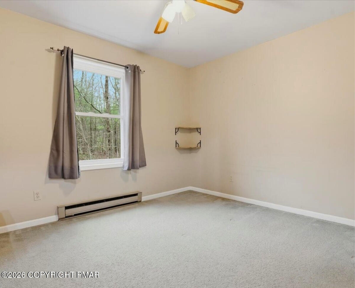 239 Sundance Road Effort, PA 18330 - Photo 27 of 60 an empty room with windows