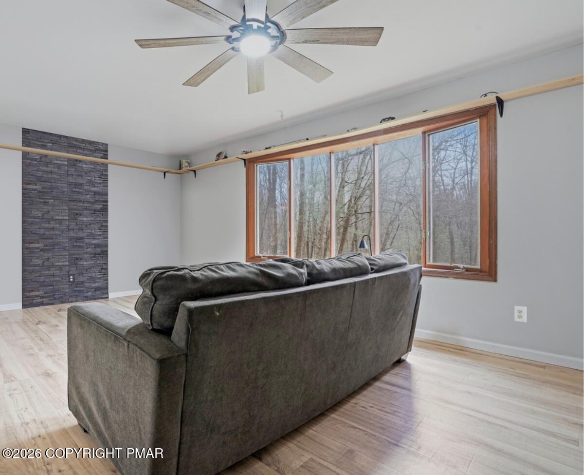 239 Sundance Road Effort, PA 18330 - Photo 4 of 60 a living room with couches and furniture
