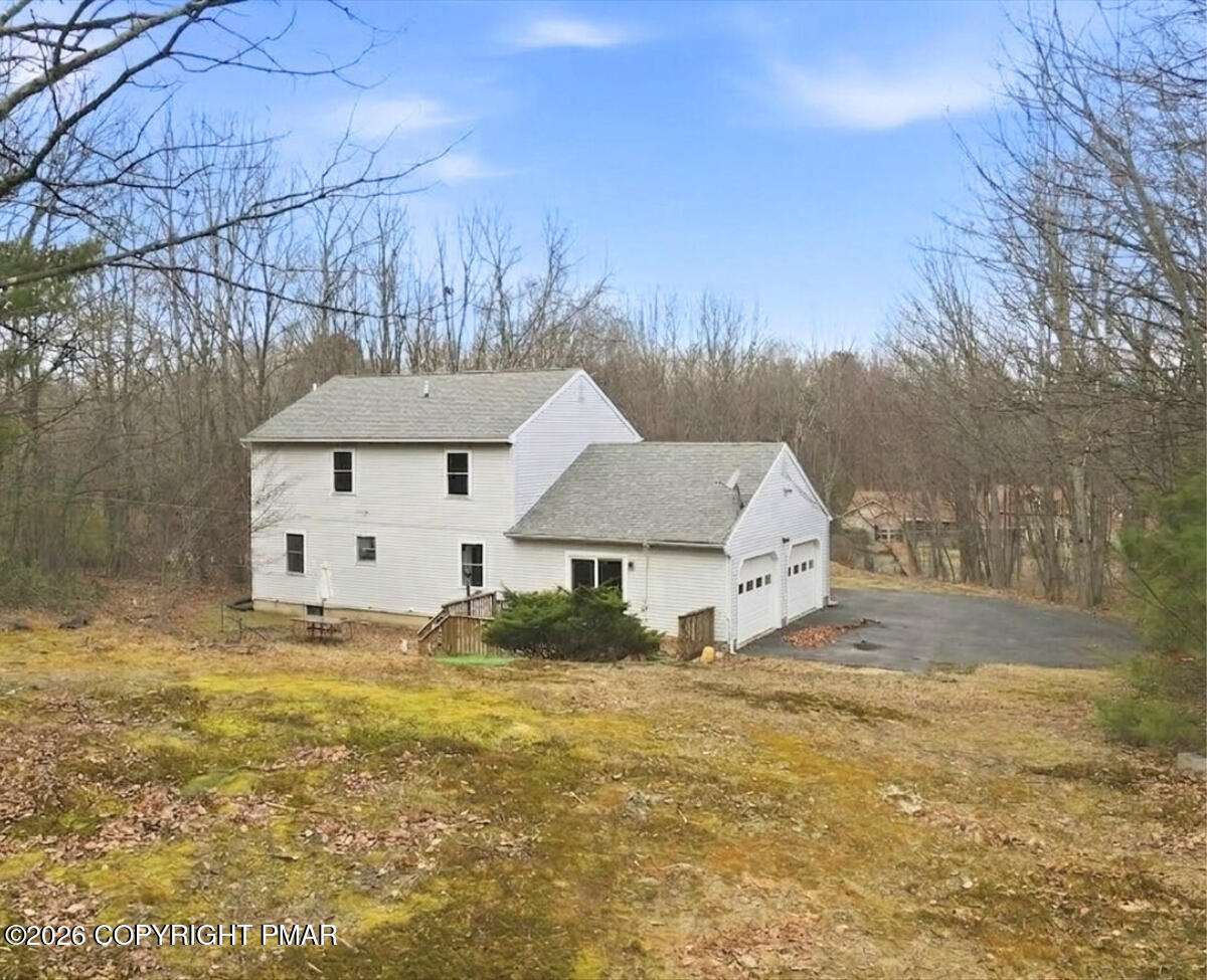 239 Sundance Road Effort, PA 18330 - Photo 44 of 60 a house view with a garden