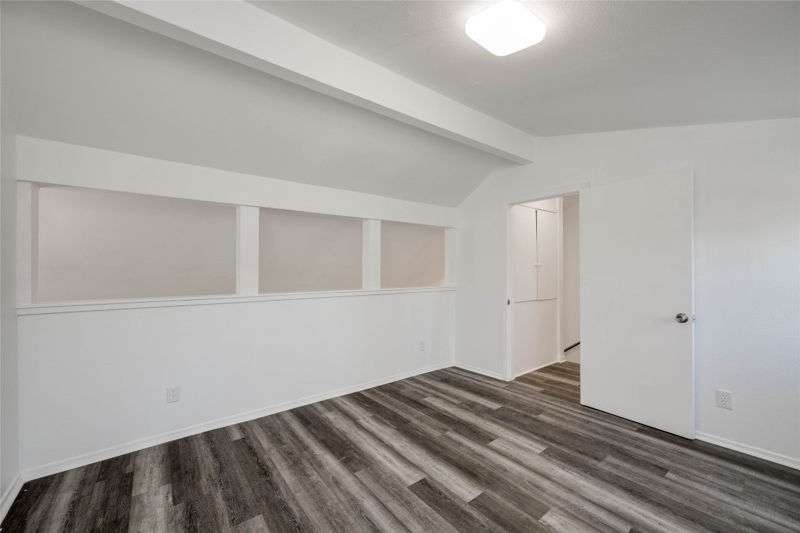 1303 East St Johns Avenue Austin, TX 78752 - Photo 20 of 30 a view of a room with wooden floor