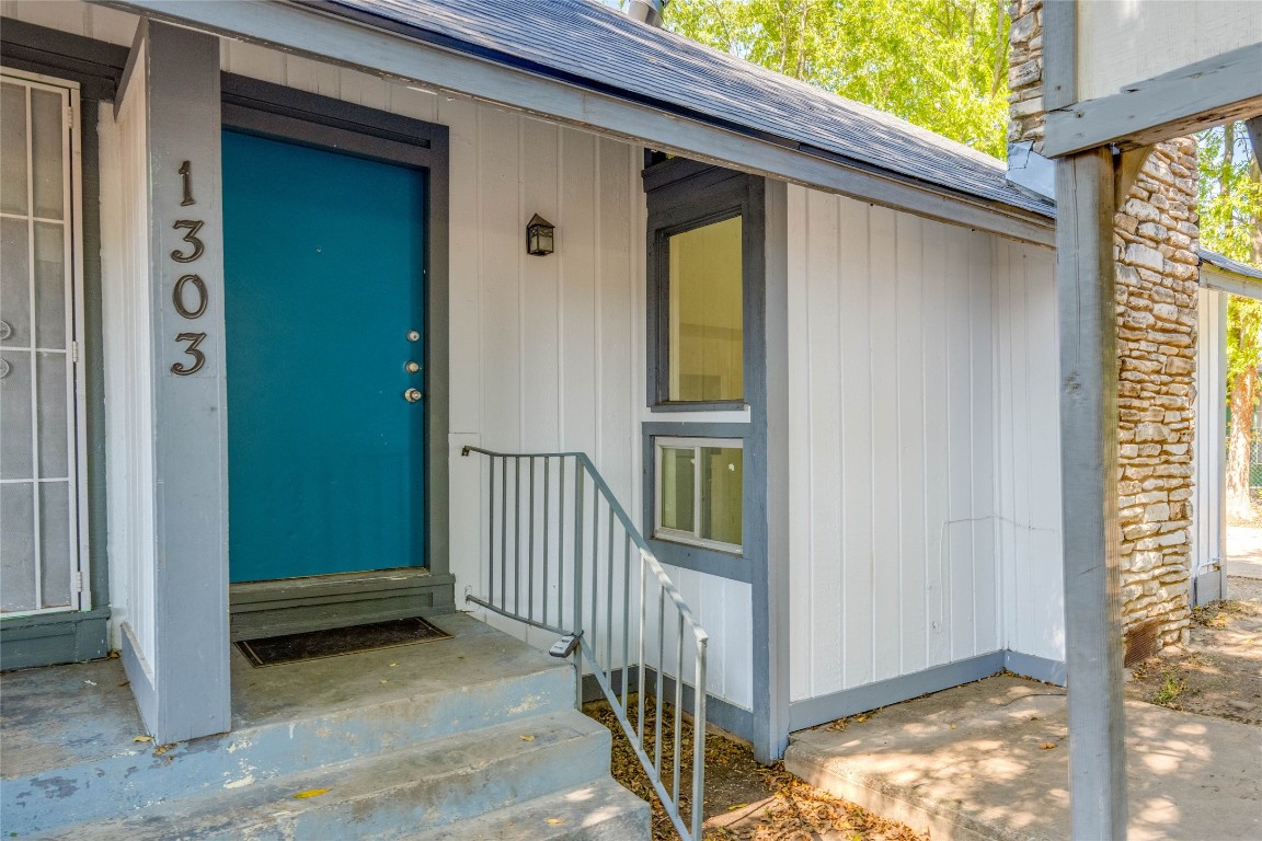 1303 East St Johns Avenue Austin, TX 78752 - Photo 2 of 30 a view of a porch with a backyard