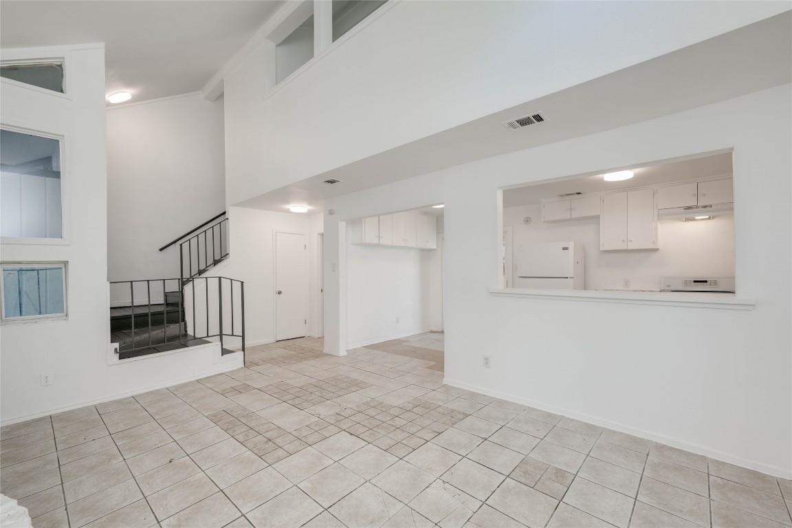 1303 East St Johns Avenue Austin, TX 78752 - Photo 7 of 30 a view of a hallway with storage and utility