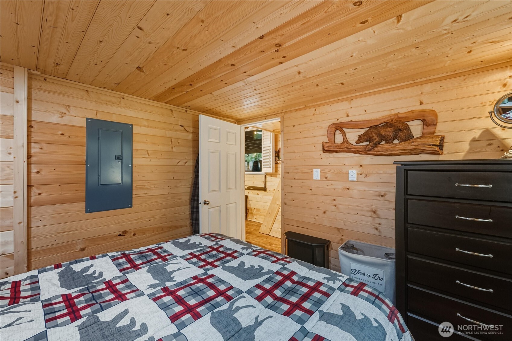 1015 Maple Lane Maple Falls, WA 98266 - Photo 11 of 39 a bedroom with a bed and wooden floor