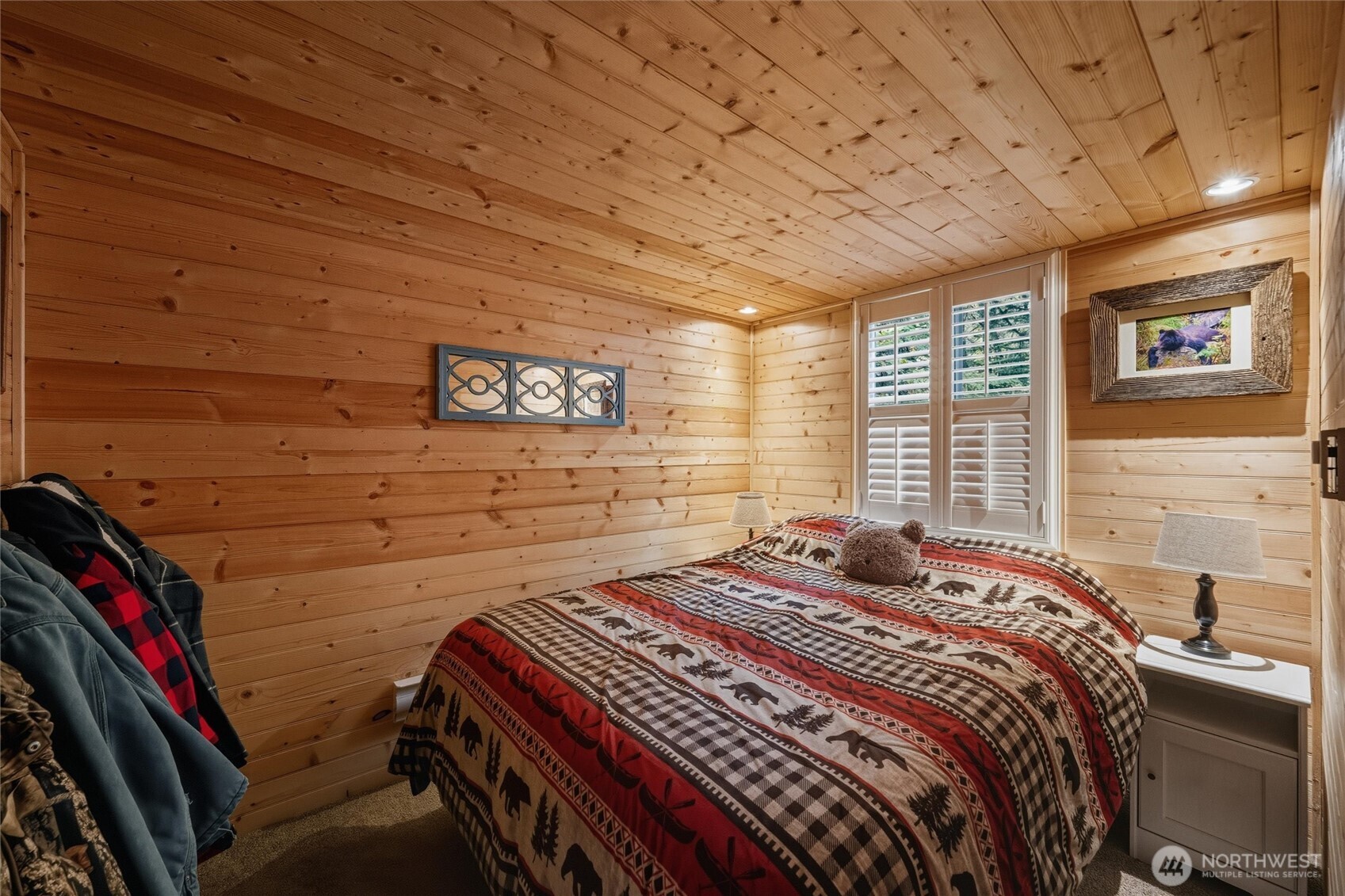 1015 Maple Lane Maple Falls, WA 98266 - Photo 14 of 39 a bedroom with a bed and a wall painting