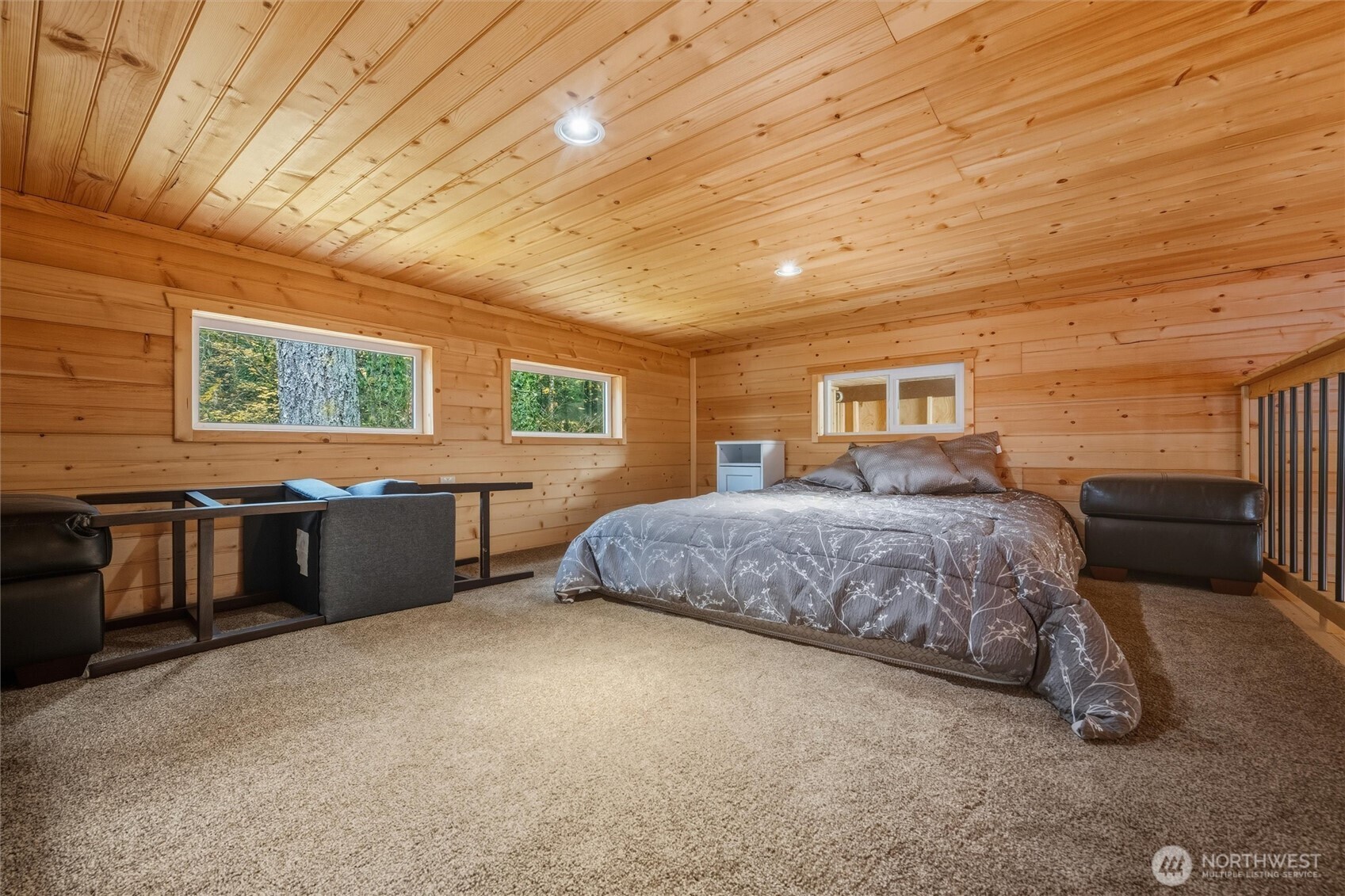 1015 Maple Lane Maple Falls, WA 98266 - Photo 16 of 39 a spacious bedroom with a bed and large windows