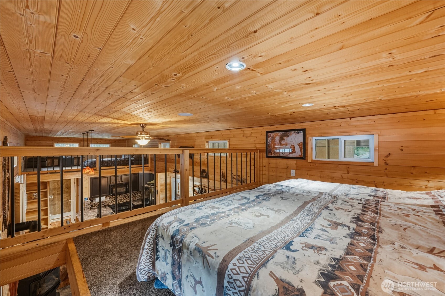 1015 Maple Lane Maple Falls, WA 98266 - Photo 21 of 39 a bed sitting in a spacious bedroom next to a larger window