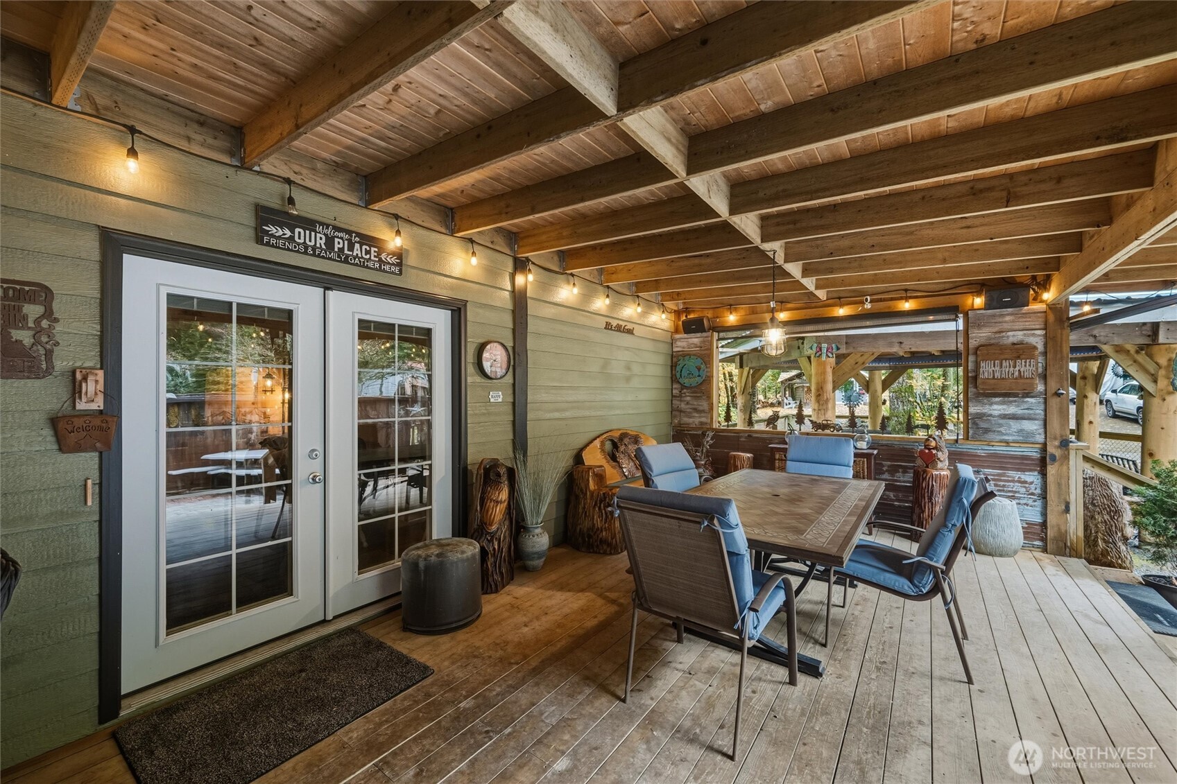 1015 Maple Lane Maple Falls, WA 98266 - Photo 31 of 39 a view of a porch with furniture and wooden floor
