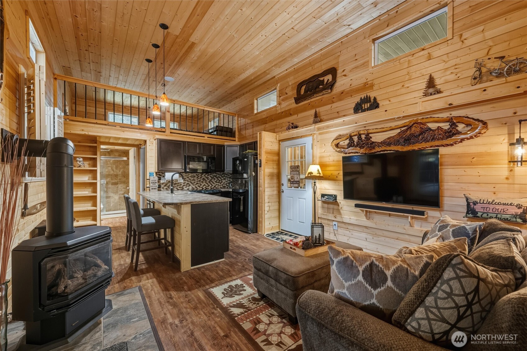 1015 Maple Lane Maple Falls, WA 98266 - Photo 6 of 39 a living room with furniture and a flat screen tv