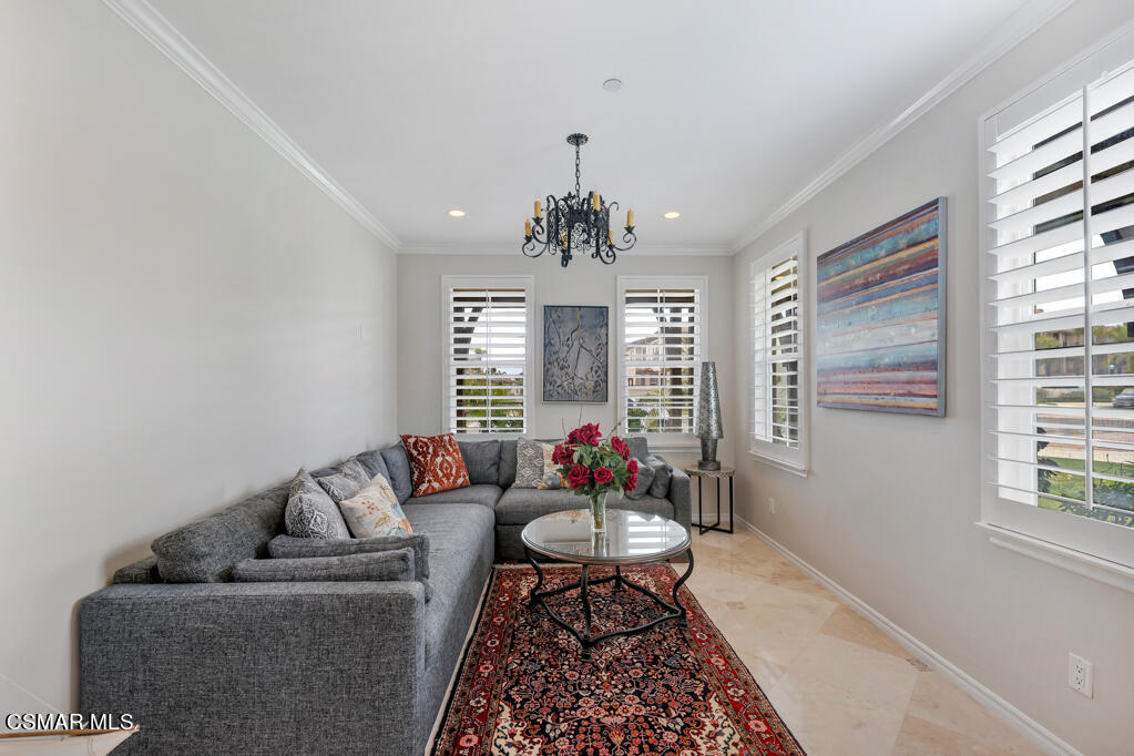 1410 Viewpoint Drive Oxnard, CA 93035 - Photo 11 of 73 a living room with furniture and a chandelier