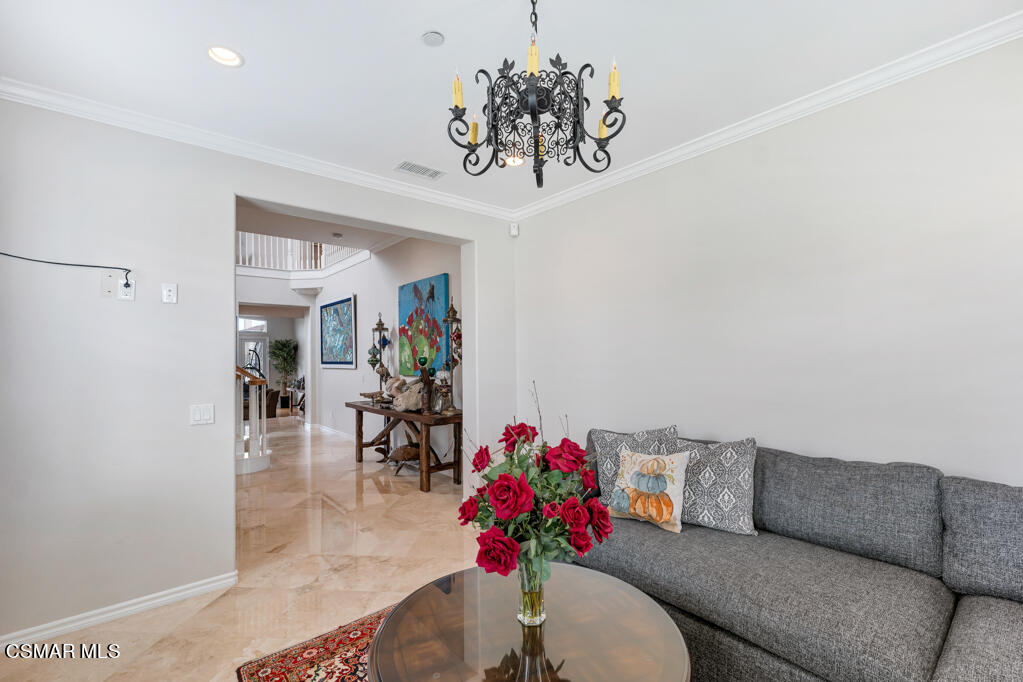 1410 Viewpoint Drive Oxnard, CA 93035 - Photo 13 of 73 a living room with furniture and flowers
