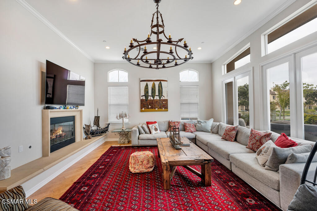 1410 Viewpoint Drive Oxnard, CA 93035 - Photo 15 of 73 a living room with furniture a fireplace and flat screen tv