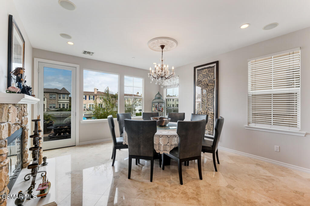 1410 Viewpoint Drive Oxnard, CA 93035 - Photo 29 of 73 a view of a dining room with furniture window and outside view