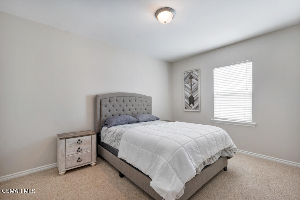 1410 Viewpoint Drive Oxnard, CA 93035 - Photo 42 of 73 a bedroom with a bed and a window