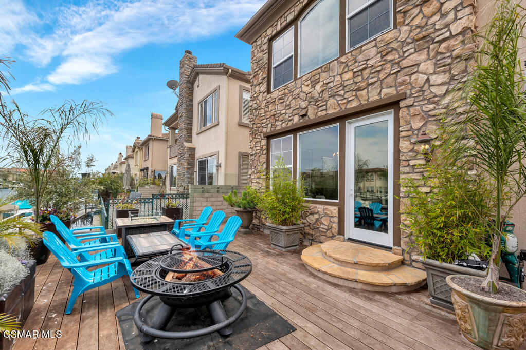 1410 Viewpoint Drive Oxnard, CA 93035 - Photo 65 of 73 a view of a patio with couches table and chairs and potted plants