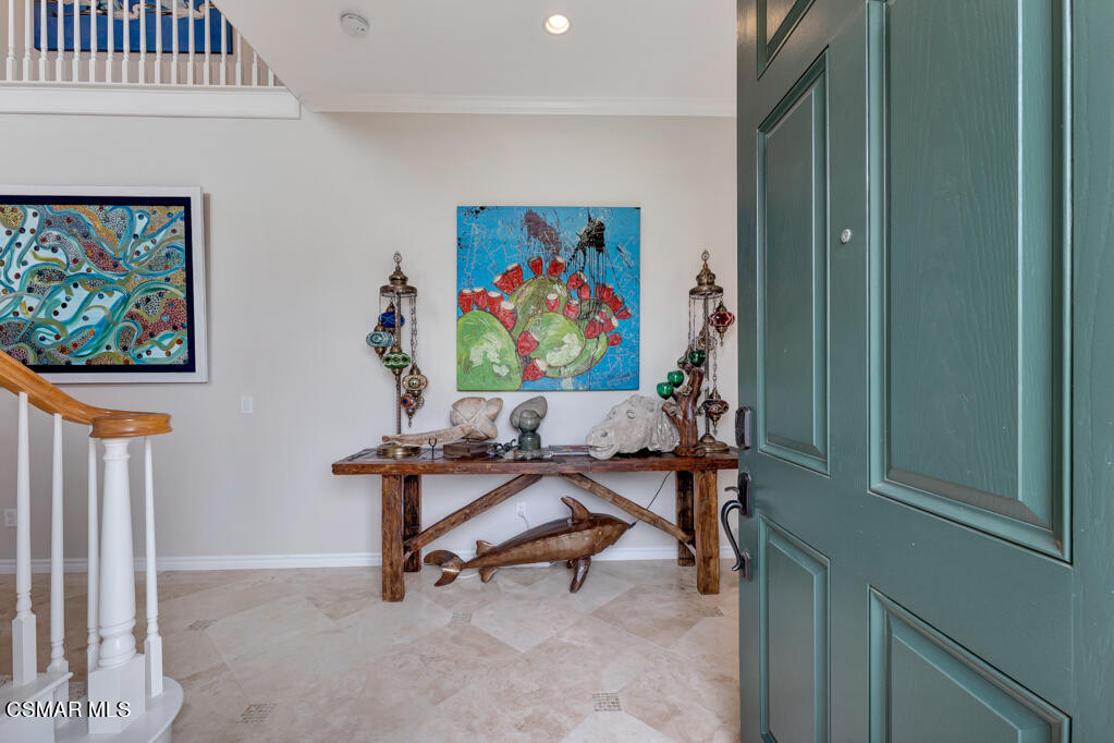 1410 Viewpoint Drive Oxnard, CA 93035 - Photo 8 of 73 a view of a workspace with furniture and toys