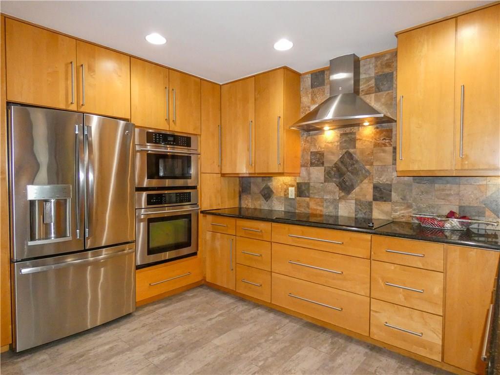 2061 Southeast Pyramid Road Port St. Lucie, FL 34952 - Photo 11 of 46 Kitchen with high end appliances