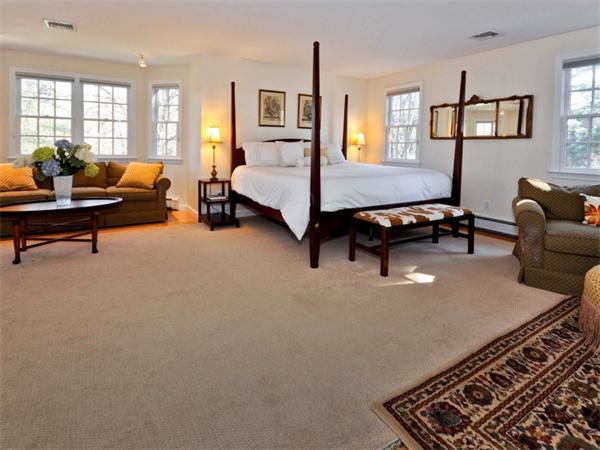19 Colonial Road Needham, MA 02492 - Photo 13 of 30 a living room with furniture and a table