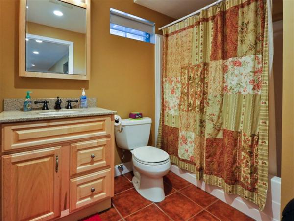 19 Colonial Road Needham, MA 02492 - Photo 25 of 30 a bathroom with a sink toilet and shower