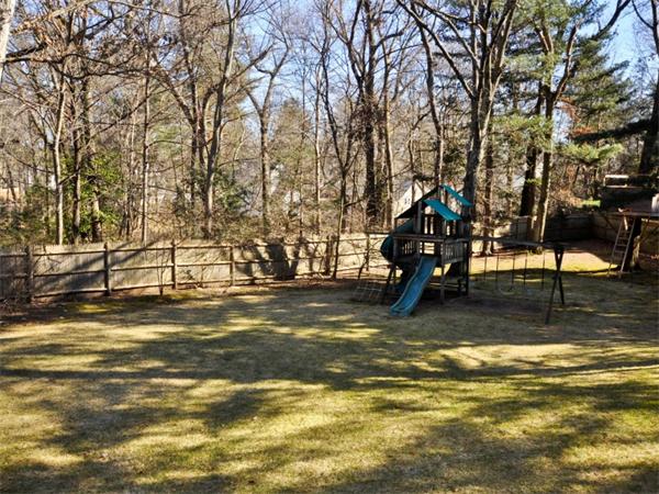 19 Colonial Road Needham, MA 02492 - Photo 3 of 30 a view of a yard with swimming pool