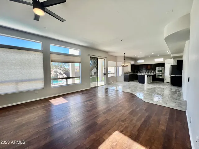 a view of living room with furniture and window