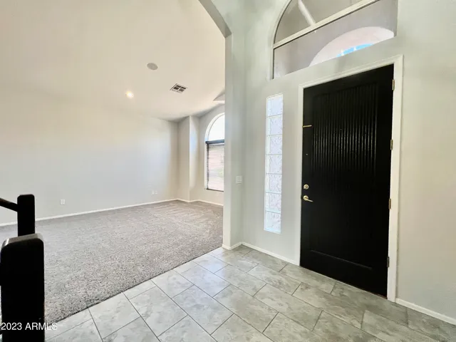 a view of a big room with a fireplace