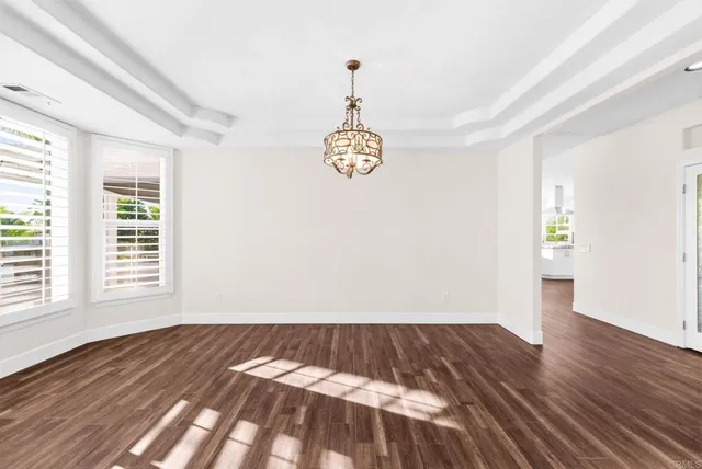 a view of a backyard with sitting area