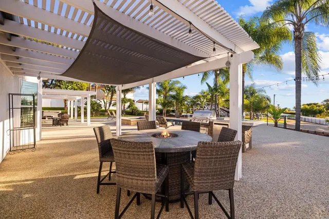 a view of the house with a swimming pool