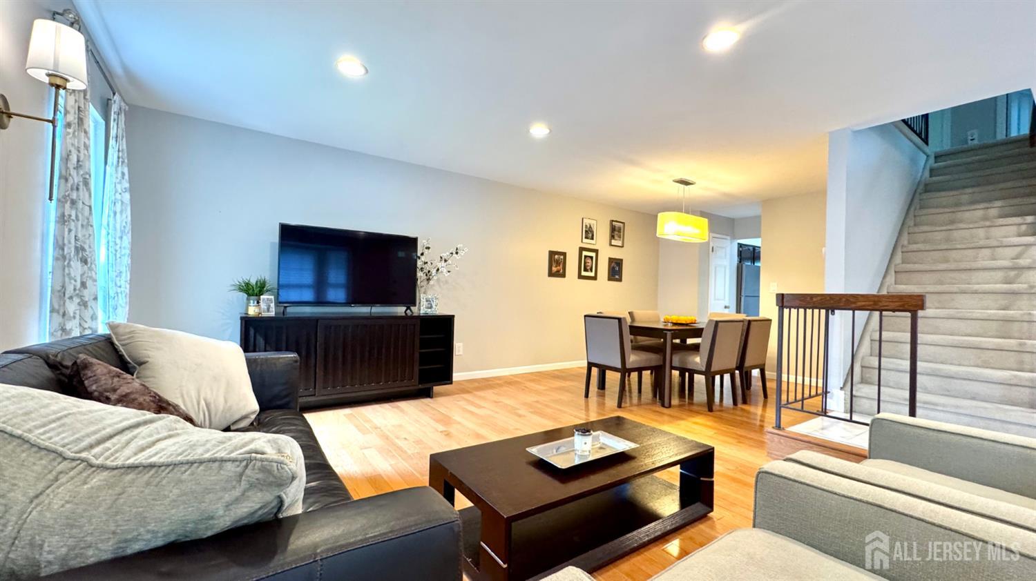 507 Timber Oaks Road Edison, NJ 08820 - Photo 3 of 17 a living room with furniture and a flat screen tv