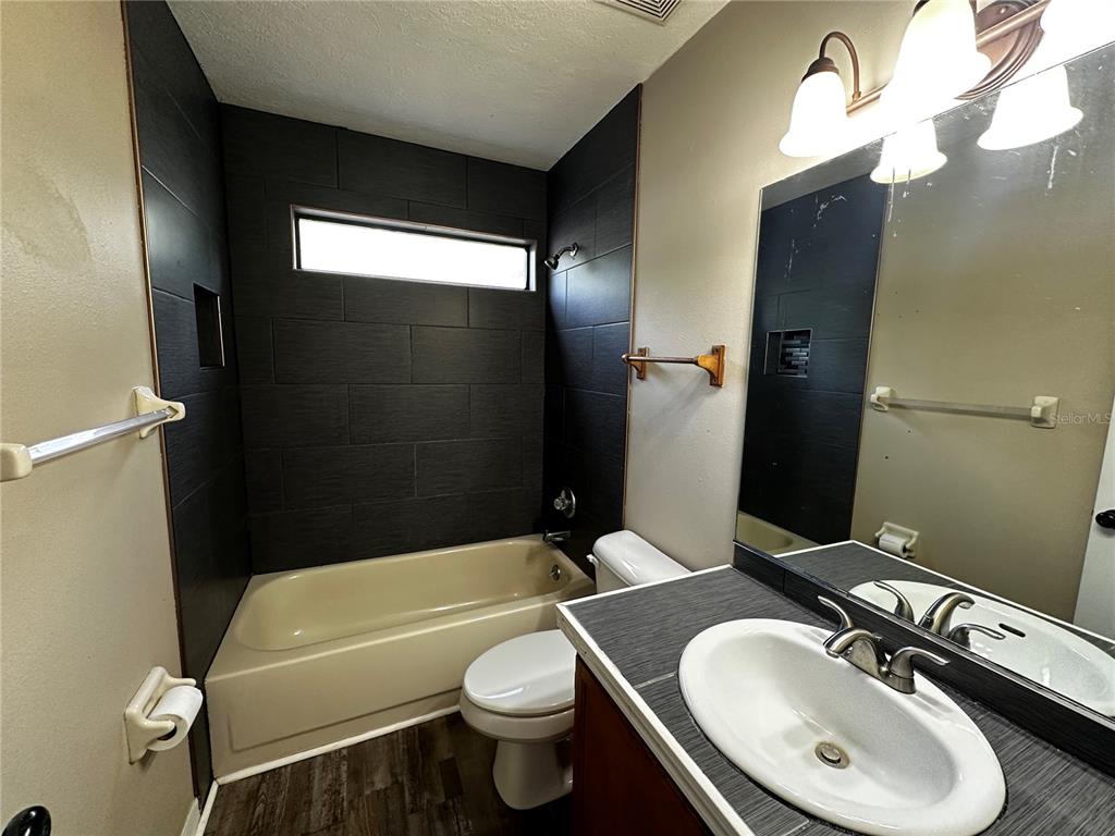 44 Teak Road Ocala, FL 34472 - Photo 6 of 12 a bathroom with a sink toilet and shower