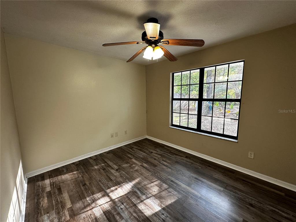 44 Teak Road Ocala, FL 34472 - Photo 7 of 12 a view of an empty room and window
