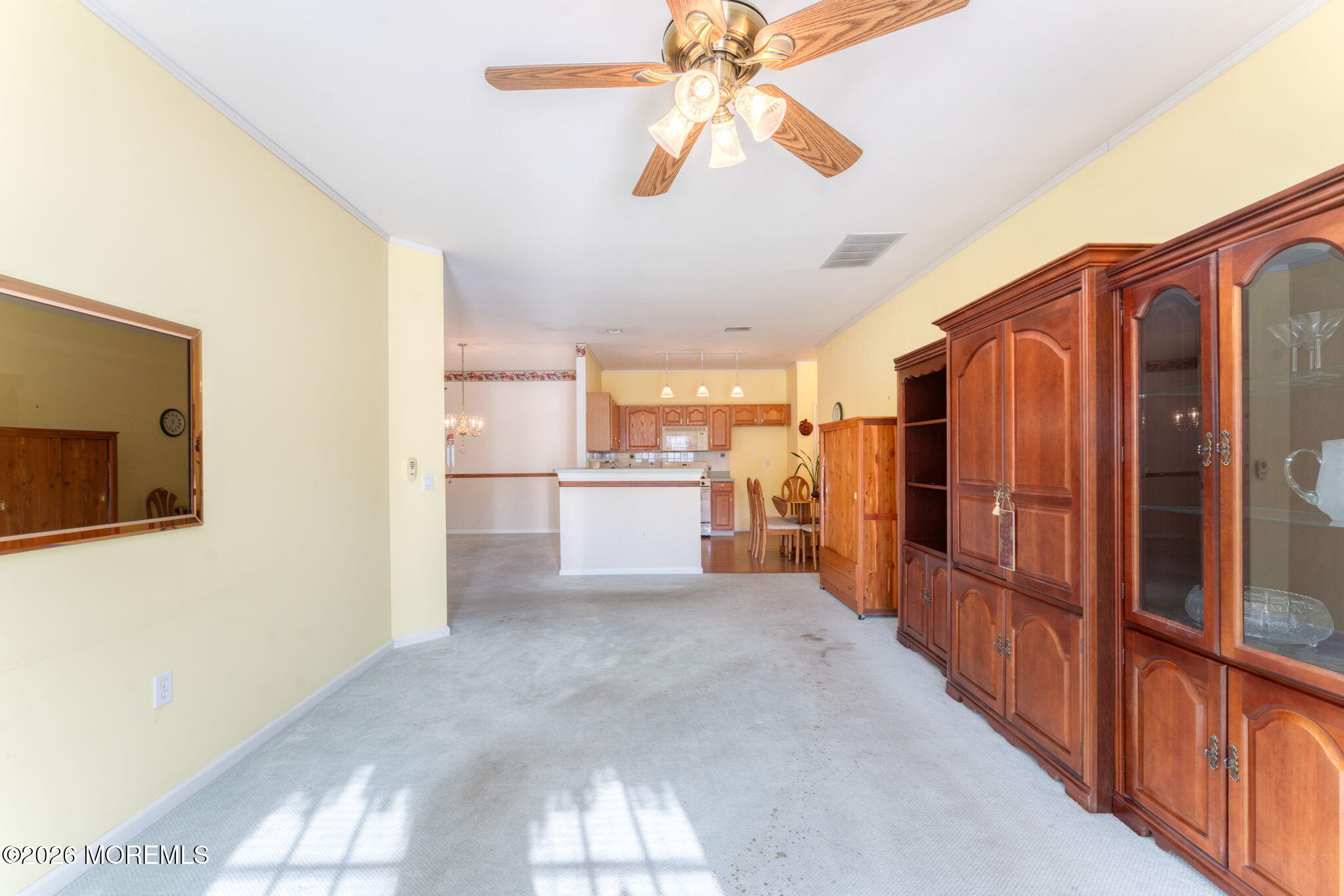 22 Foxwood Road Lakewood, NJ 08701 - Photo 11 of 35 a view of a kitchen with a sink and a refrigerator