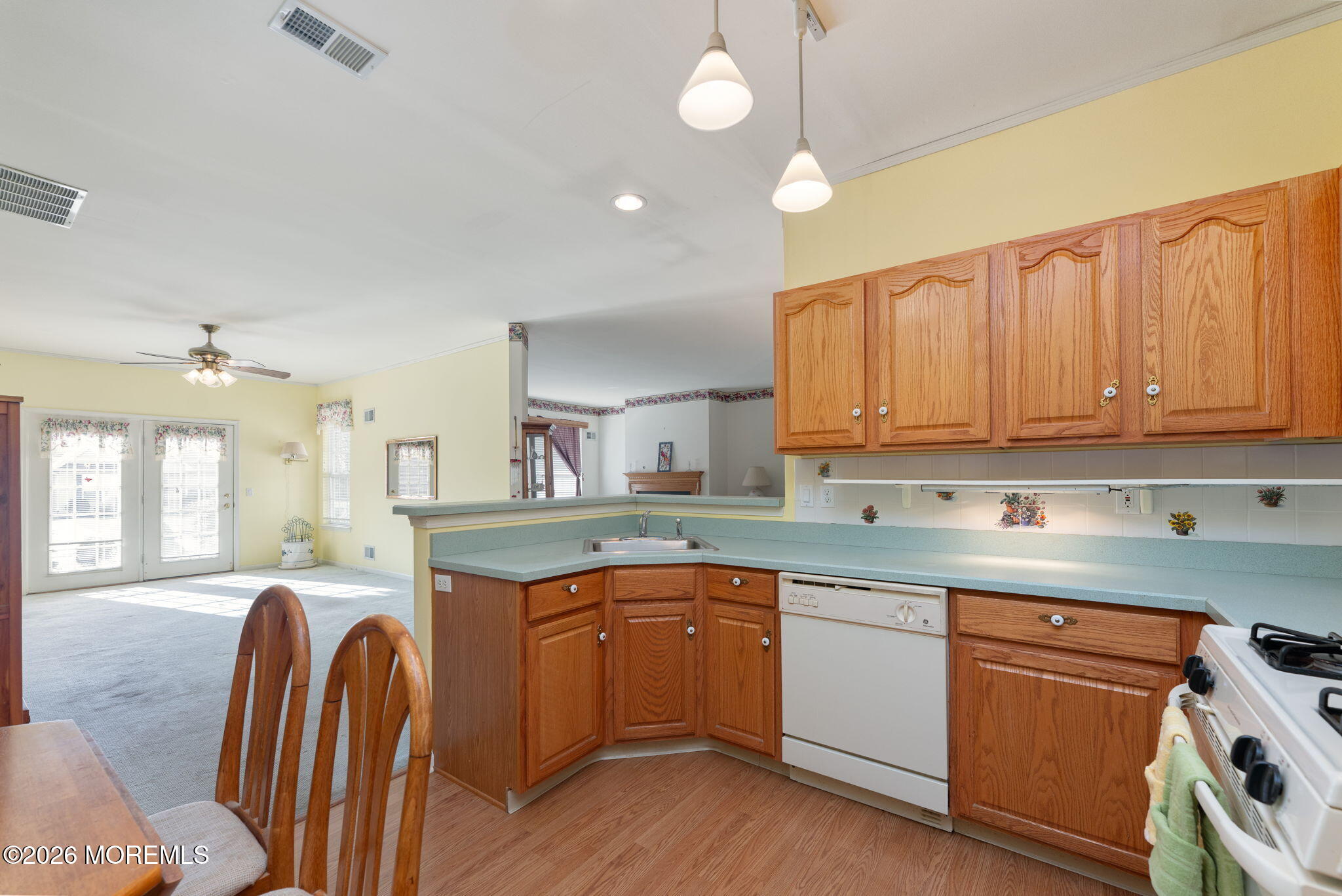 22 Foxwood Road Lakewood, NJ 08701 - Photo 17 of 35 a kitchen with stainless steel appliances granite countertop a sink a stove and cabinets