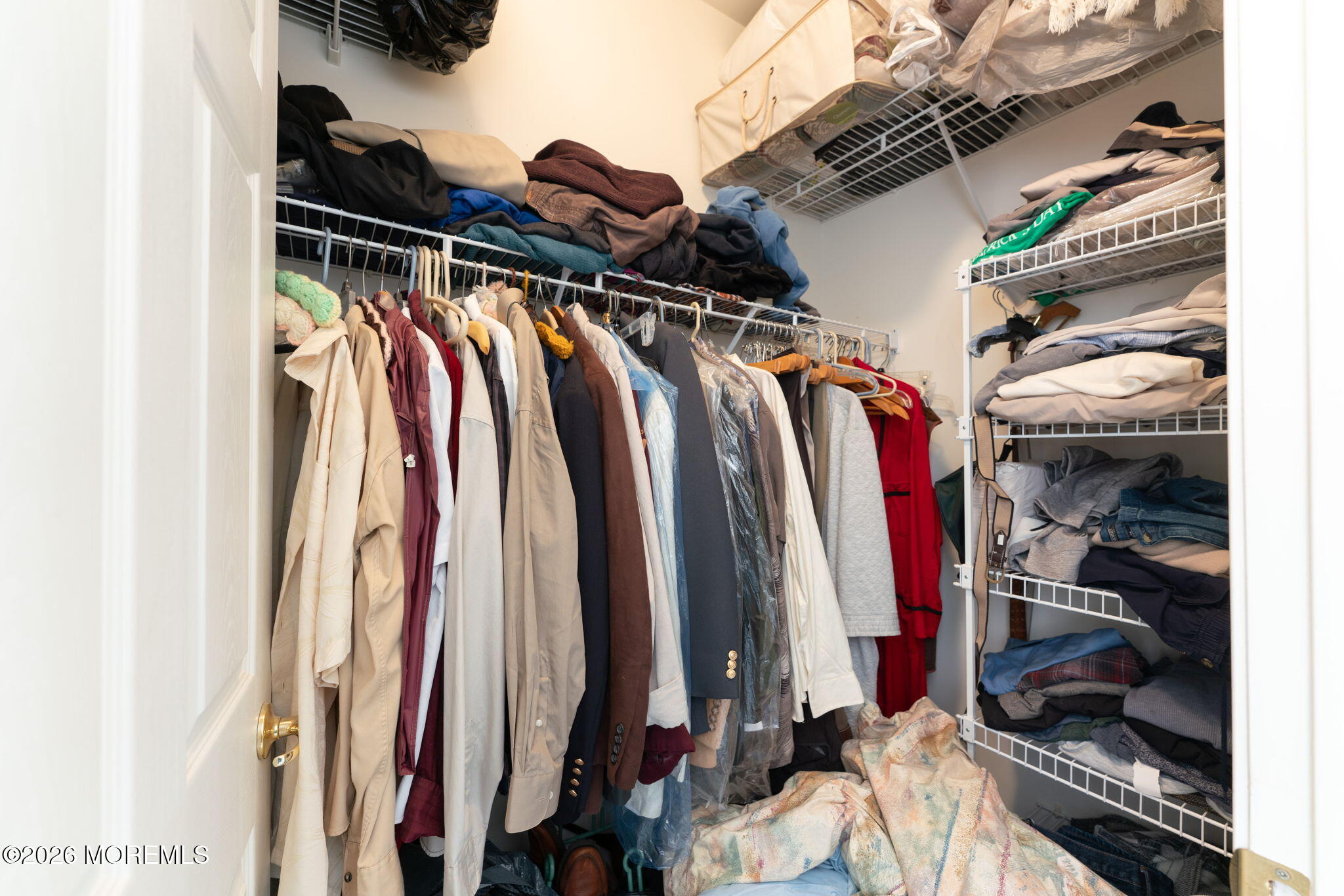 22 Foxwood Road Lakewood, NJ 08701 - Photo 20 of 35 a view of walk in closet with clothes and shoes