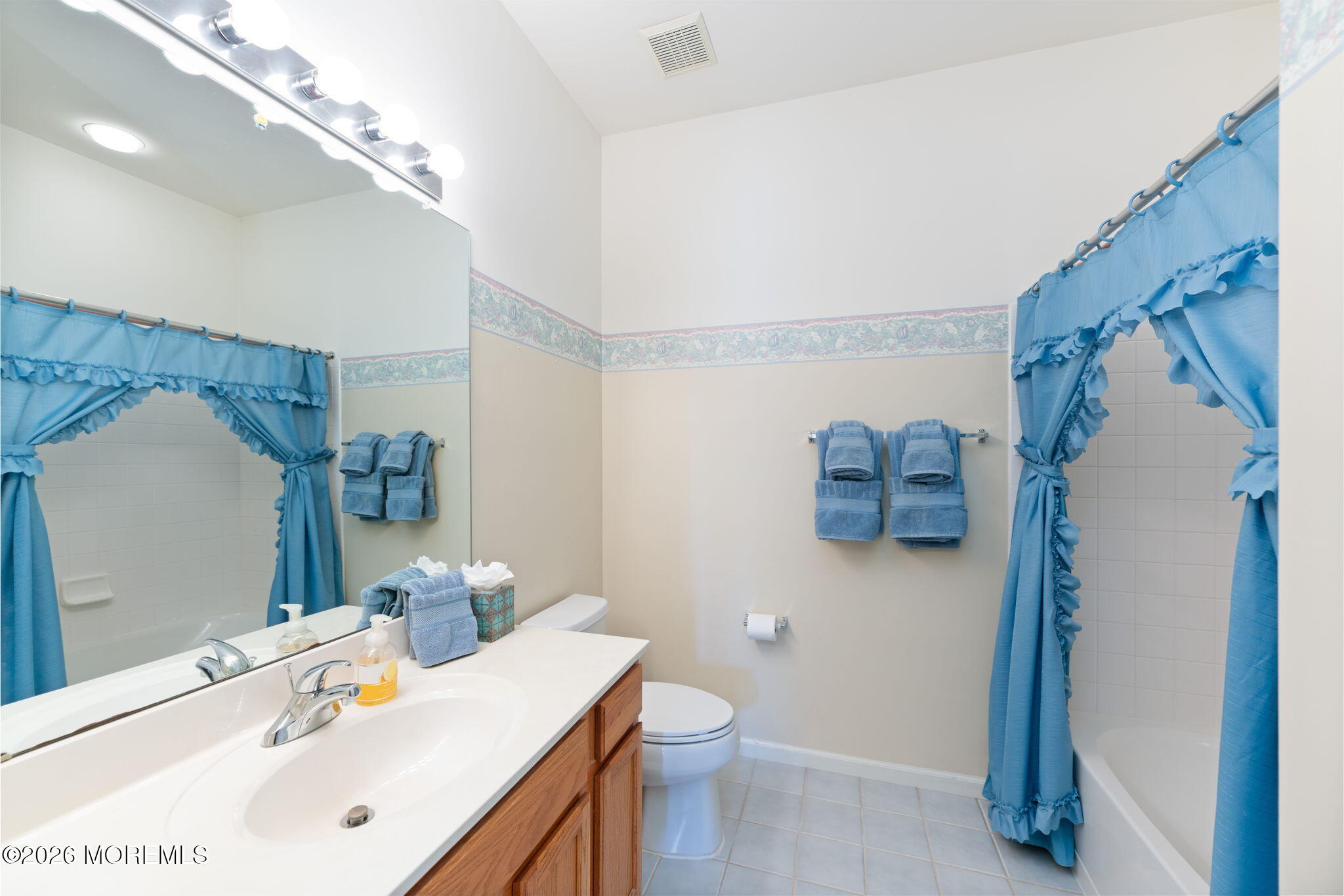 22 Foxwood Road Lakewood, NJ 08701 - Photo 23 of 35 a bathroom with a sink toilet and mirror