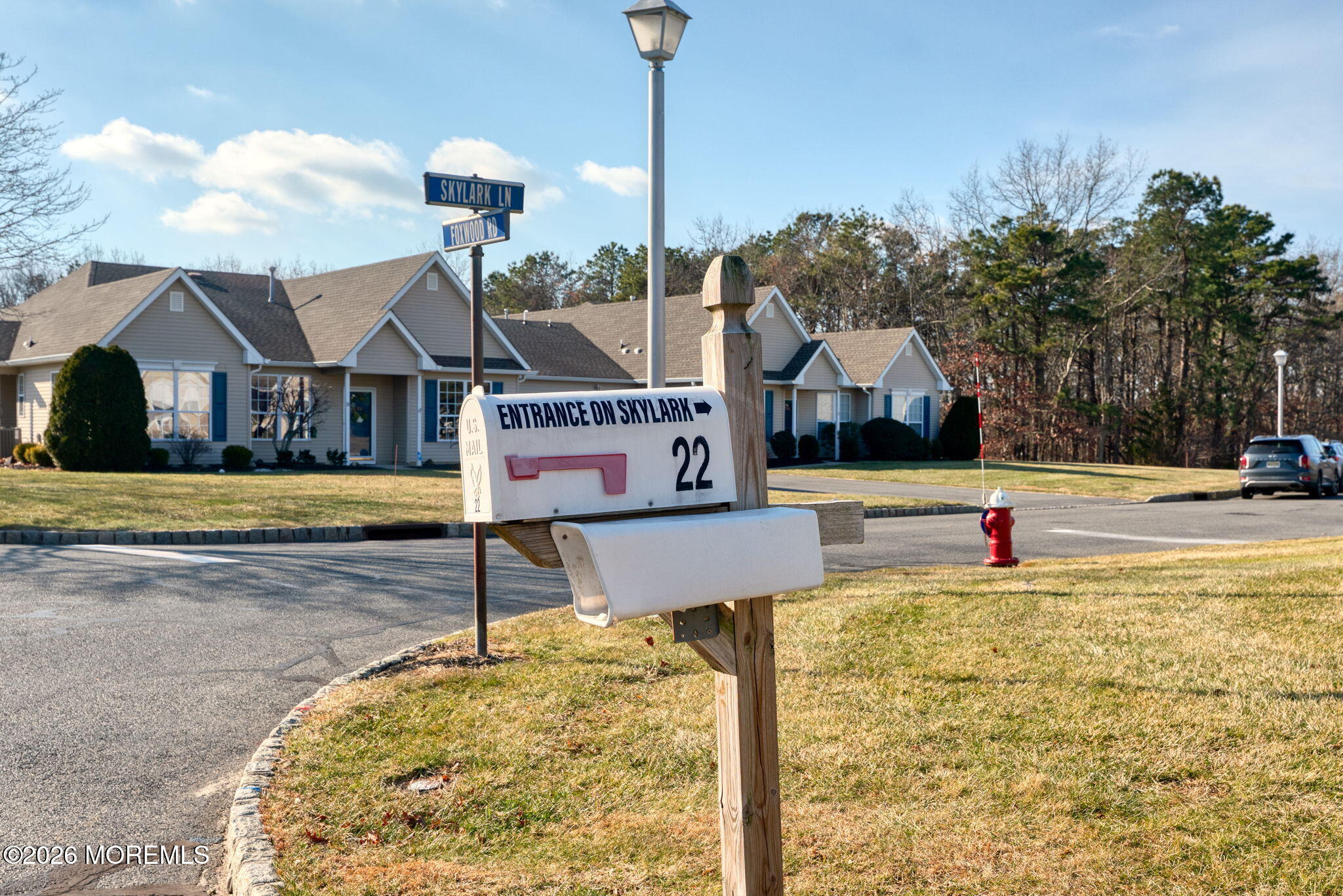 22 Foxwood Road Lakewood, NJ 08701 - Photo 27 of 35 a house view with a sitting space and garden space