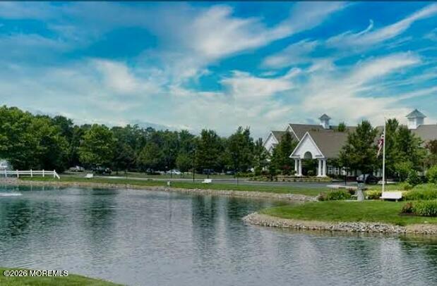 22 Foxwood Road Lakewood, NJ 08701 - Photo 33 of 35 a view of a lake with a big yard