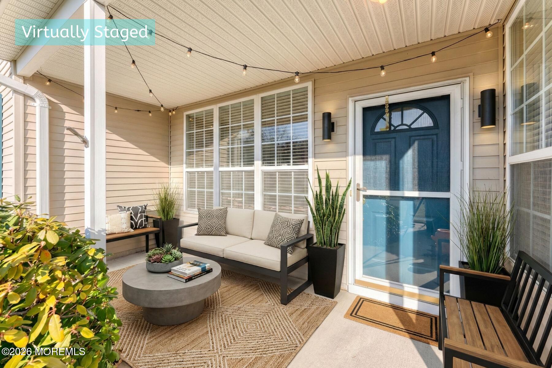 22 Foxwood Road Lakewood, NJ 08701 - Photo 4 of 35 a living room with furniture and a large window