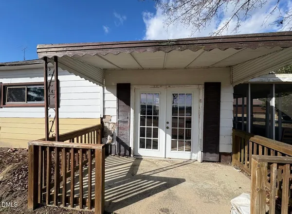 a view of a balcony with door